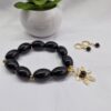 Pulsera de Ágatas y aretes negros